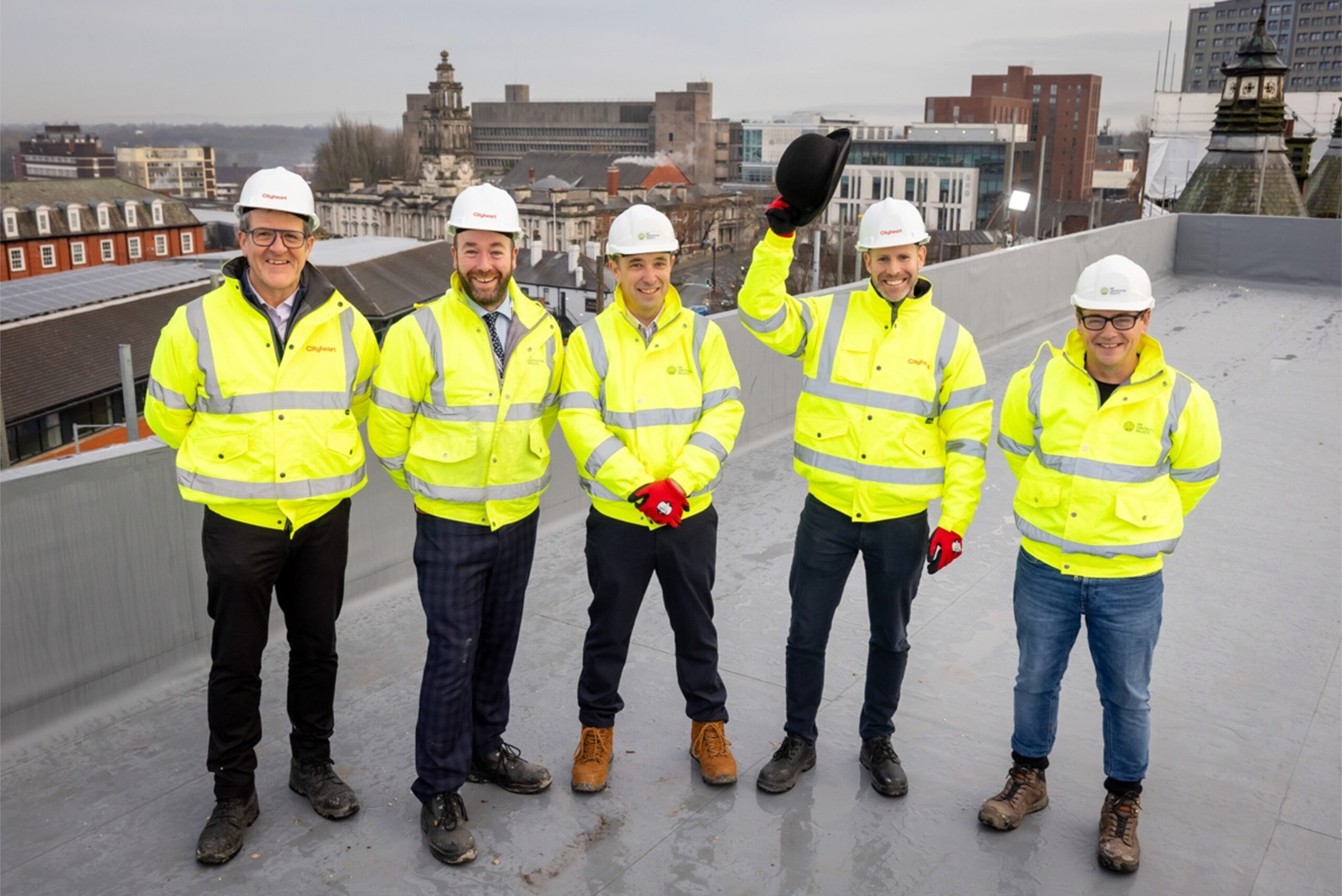 If The Hat Fits: Cityheart “tips its cap” to the topping out of Stopford Park’s Bosden